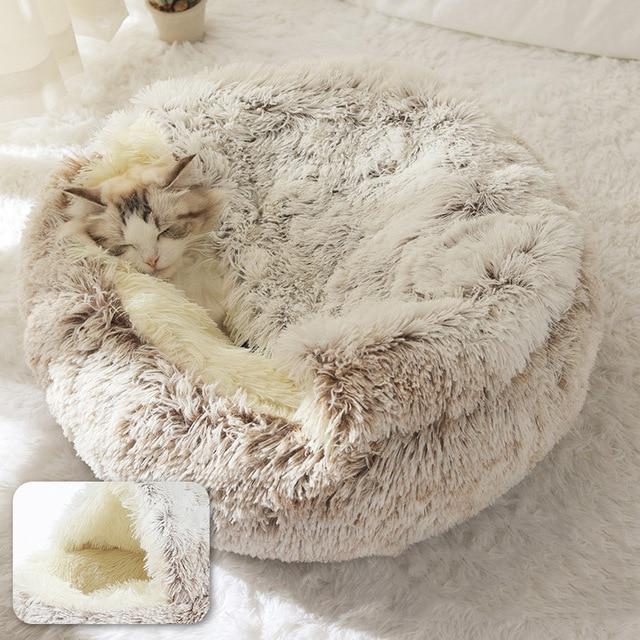 Cat curled up in a coffee latte calming pet bed