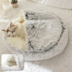 Cat relaxing in an arctic grey calming dog bed