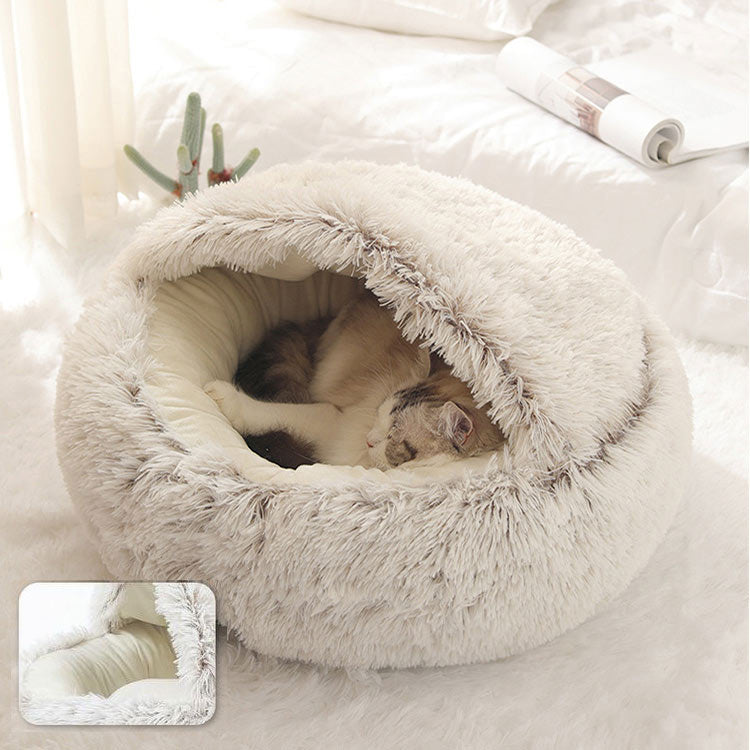 Cat sleeping in a coffee latte calming pet bed